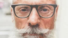Older man wearing glasses